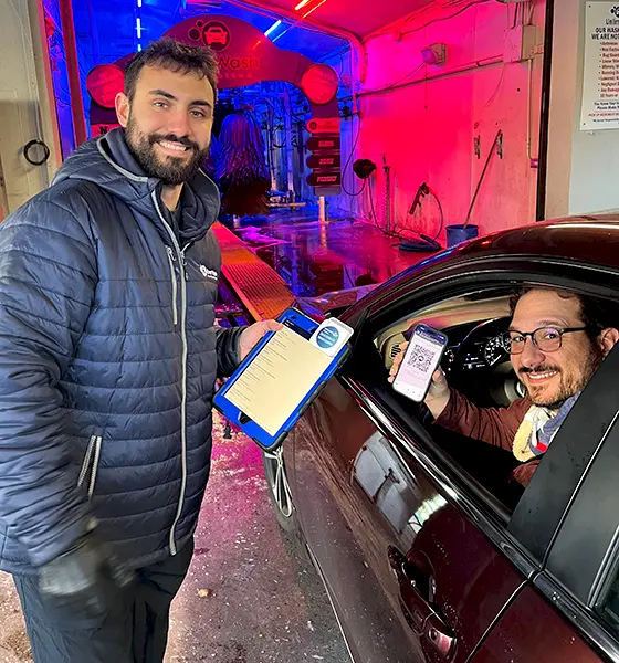Greeter with customer at car wash