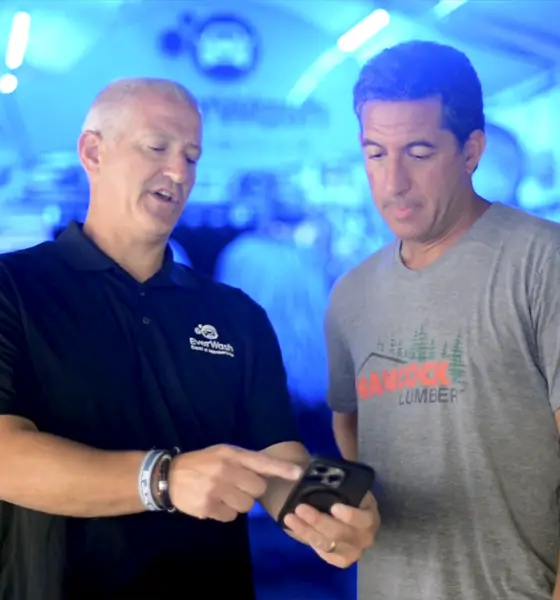 EverWash team helping car wash operator